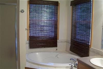 Master bath with separate shower and jetted tub.