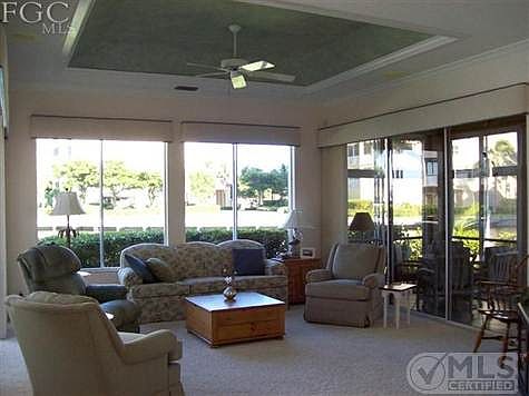 Beautiful Views from all the windows and door in the great room. Custom molding and paint in the ceiling of great room. Porch is all weather and views the canal.