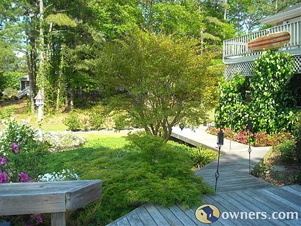 Deck boardwalk leading toward outdoor shower