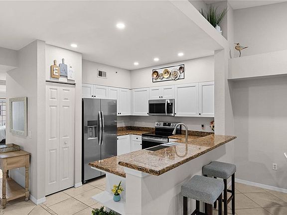 4th image of 10100 Villagio Palms WAY #202