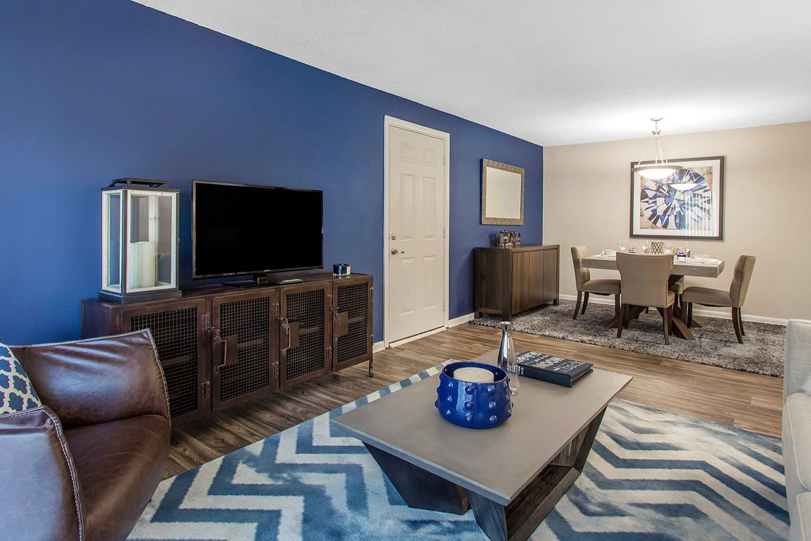 Experience the comfort and style of this urban living room and dining space, perfect for entertaining.