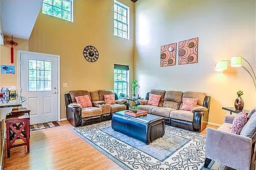 Spacious Family room with high ceiling.