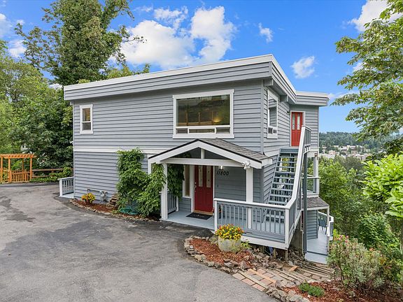 Lower unit is down the set of stairs to the right of the home.