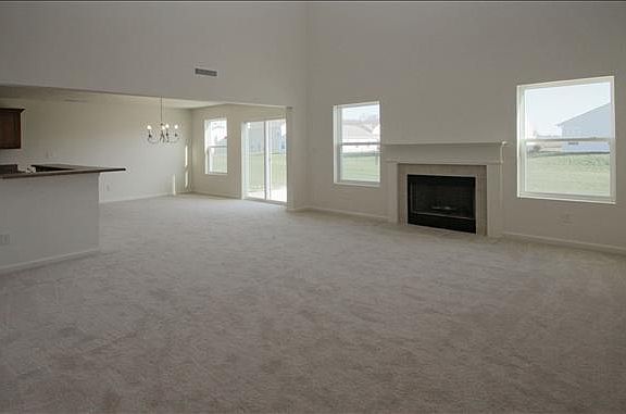 Great room with woodburning fireplace