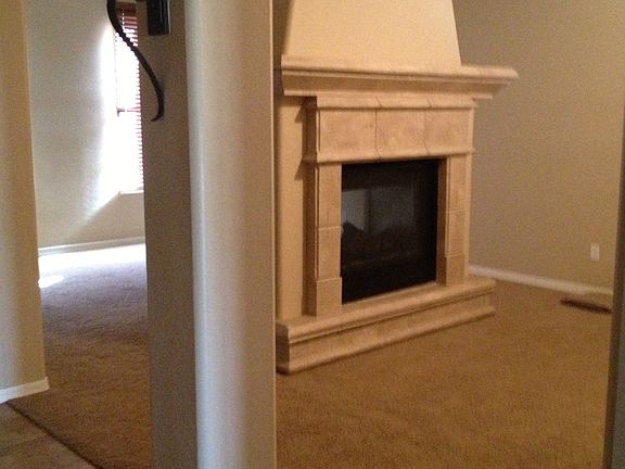 Floating fire place between dining room and living room