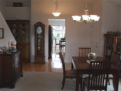 View of entry way, dining room and kitchen.