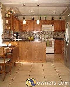 New tile, quartz, and mosaic backsplash