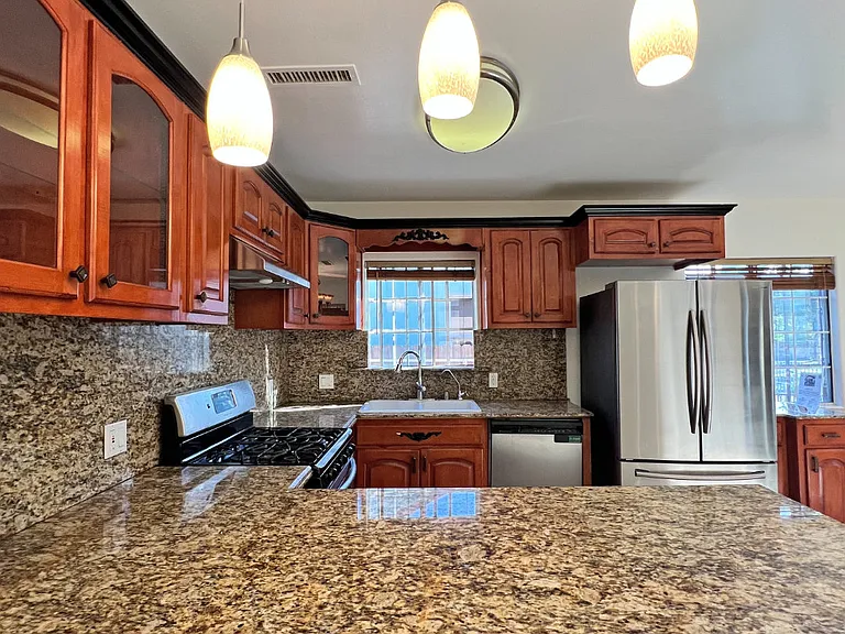 Large granite surface for diner or buffet style gatherings.