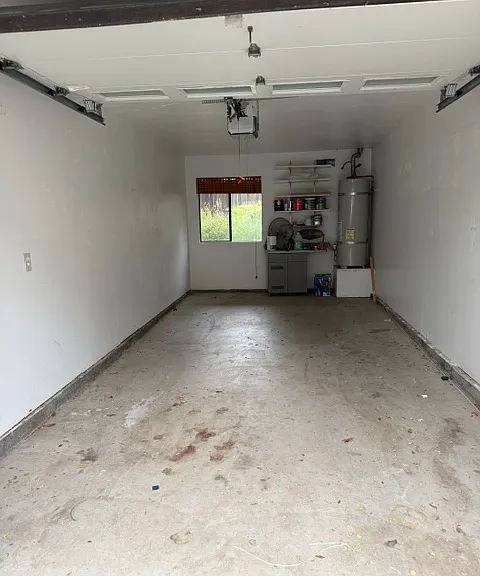 Second garage. Attached but not accessible from inside the unit. Automated garage door opener.
