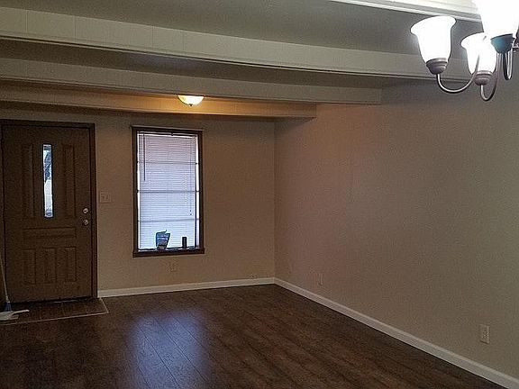 Living room looking to front door