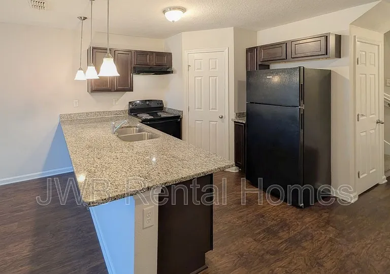8401 McGirts Village Ln — Photo 3
