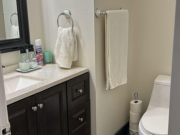 Half bathroom on the first floor that each tenant can use.