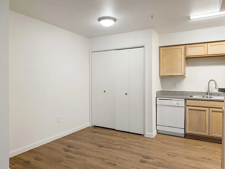 B1 Entry, Dining Room, Utility Closet, and Kitchen B1 Entry, Dining Room, Utility Closet, and Kitchen