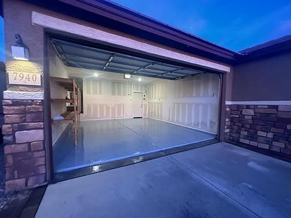 Epoxied garage and built in shelves.
