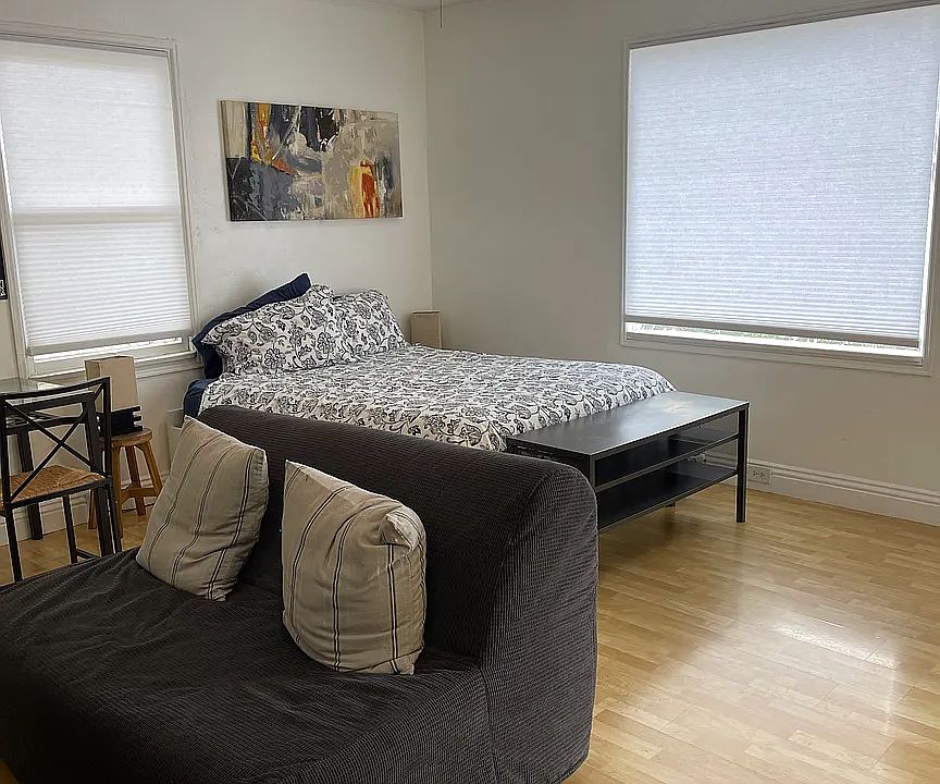 Large windows with cordless cellular blinds.