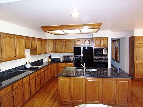 Kitchen with Slab Granite Counters!