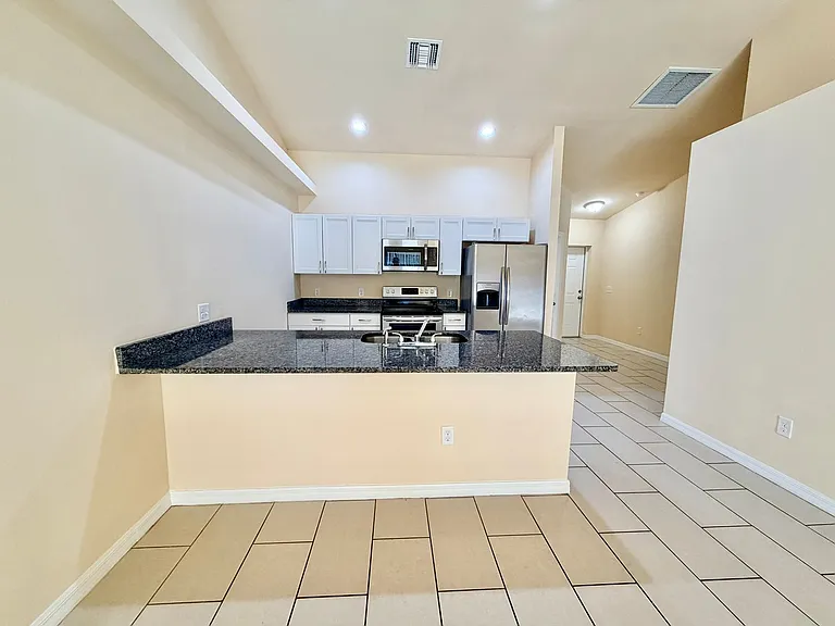 1044 NE 8th Pl — Photo 13