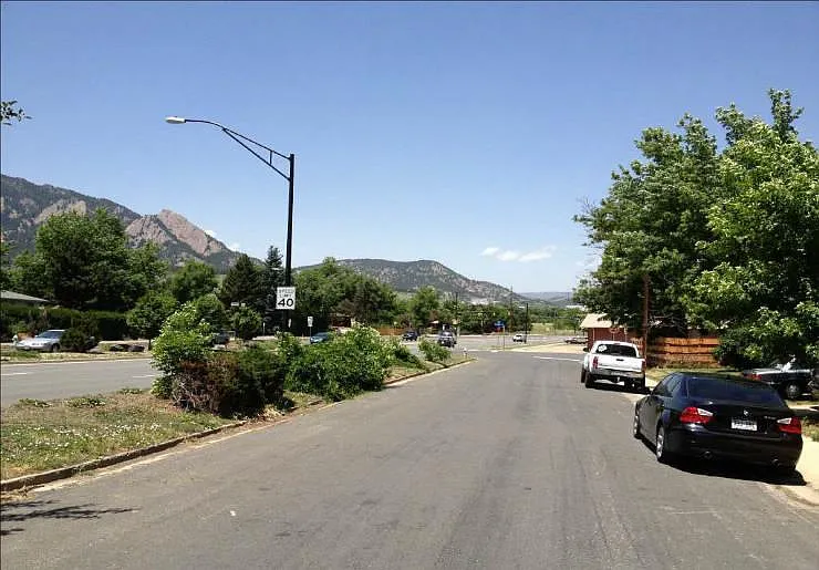 View of Flatirons and Bus Stop from 416 S Lashley