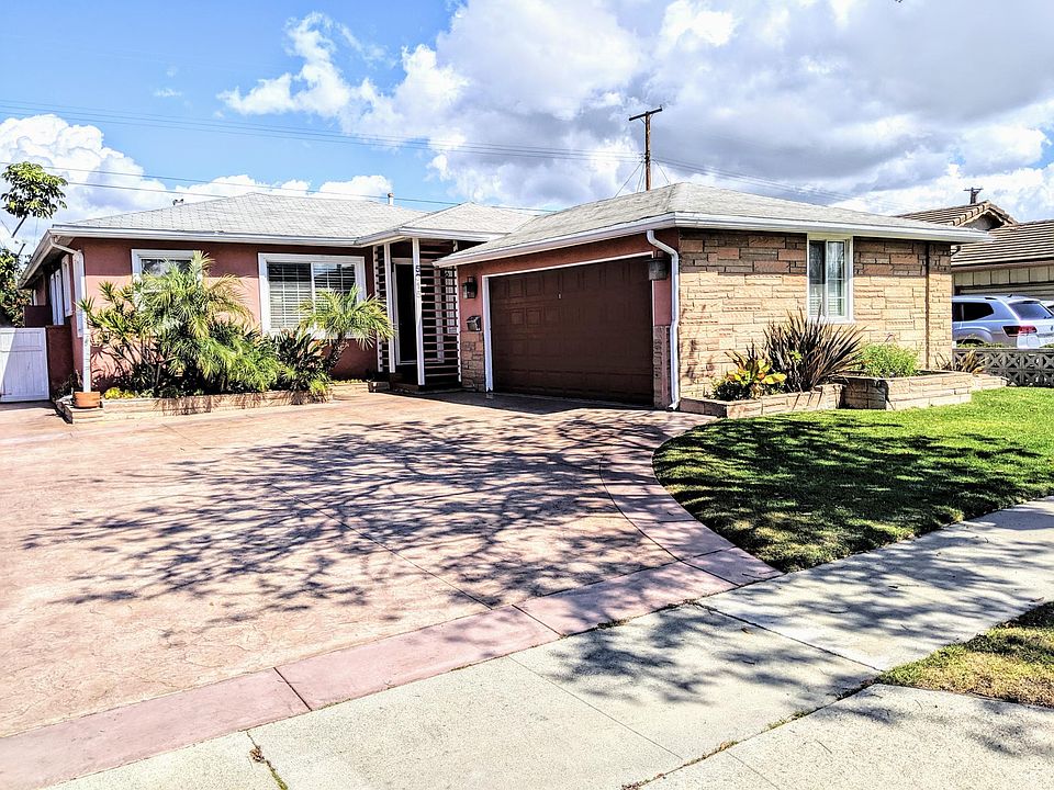 2-car garage and large driveway that can accommodate three vehicles