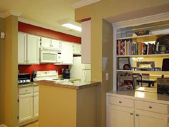 Wonderful nook to put cookbook and or dishes.