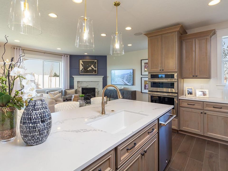 Representative Photo - Distinctive open-concept kitchen with designer-curated finishes