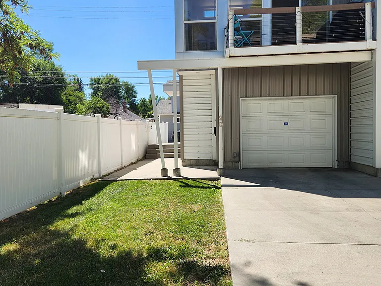 Exterior entrance with garage. You can enter the house from the garage as well.
