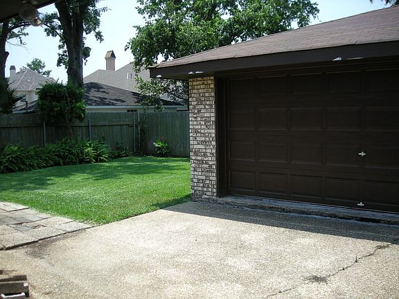 Double Garage is paneled and carpeted for use as gameroom