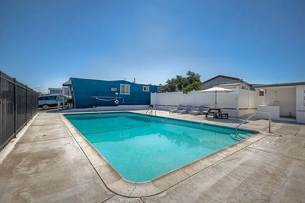 Our community's seasonal pool offers a refreshing escape _ the perfect place to relax and cool off during the warmer months.