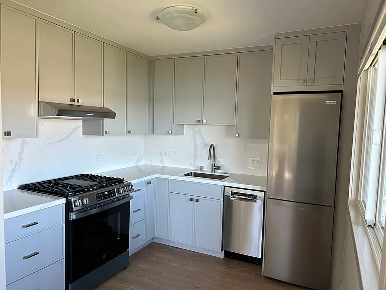 Brand new kitchen. Stainless steel appliances, Bosch dishwasher. Granite countertops and backsplash.