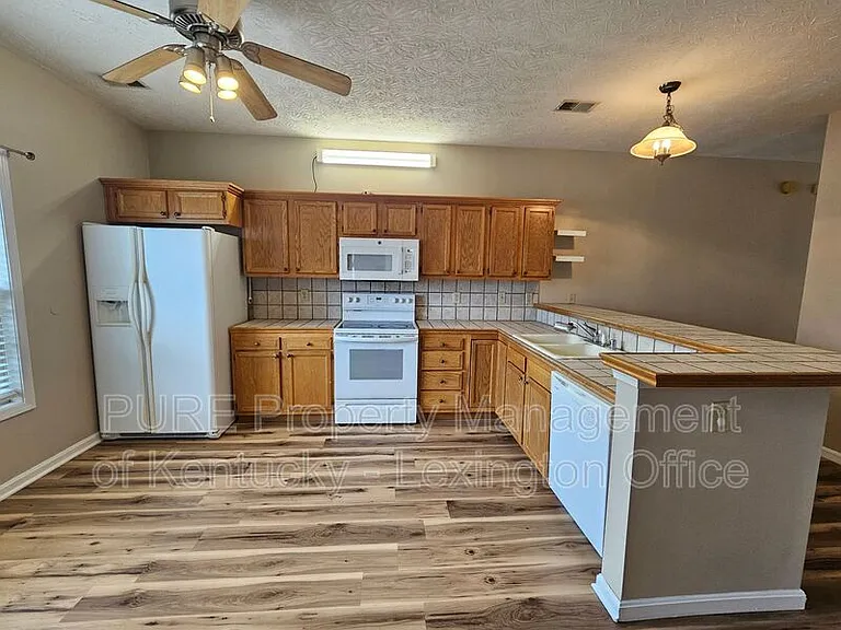 3169 Roundway Down Ln — Photo 7