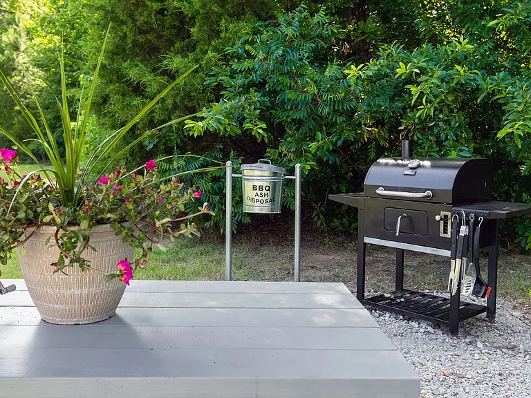 Our picnic area is equipped with a charcoal grill for joyful cookouts with friends and family.