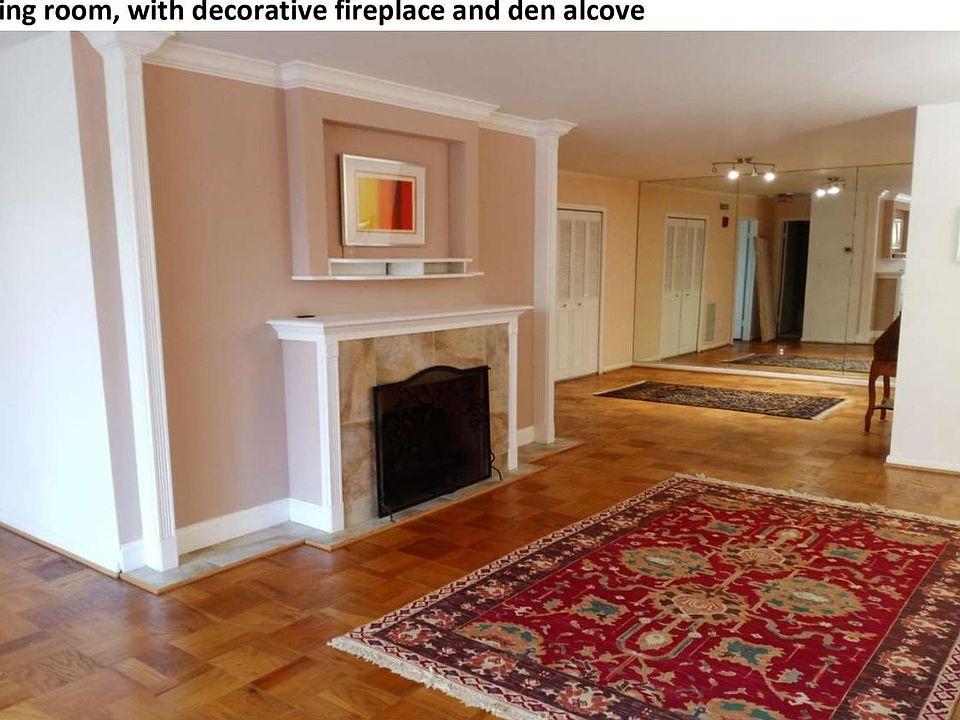 Living room, den area and decorative fireplace