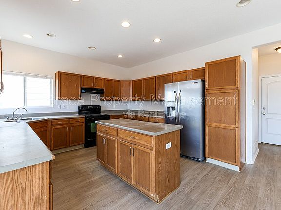 5th image of 10289 E 113th Ave