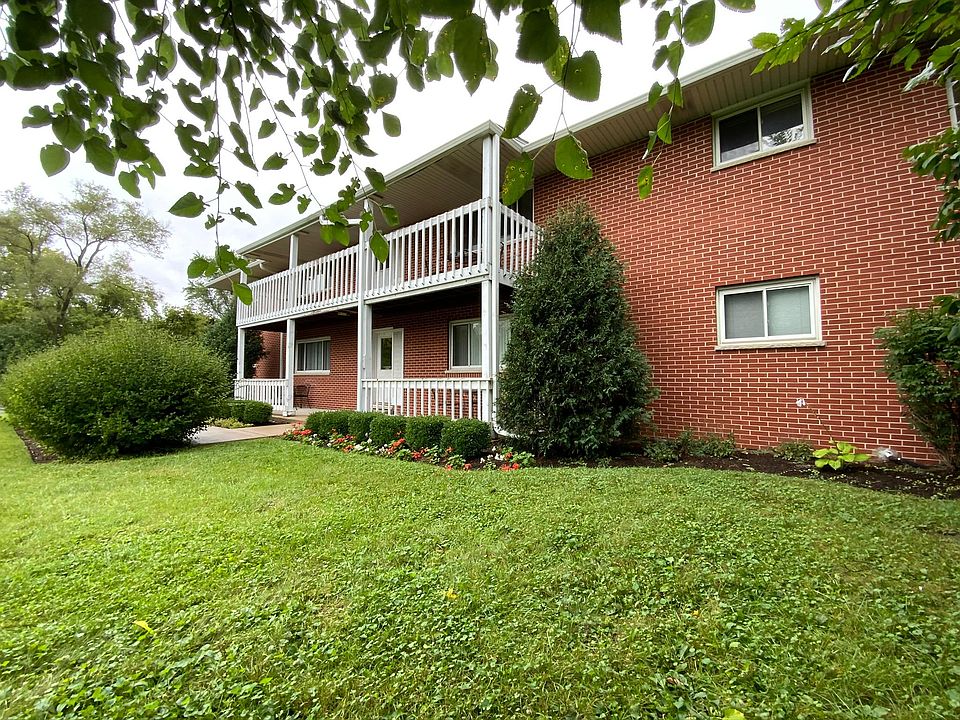 Exterior photo of 1904 building - Spacious property with the building are far away from Route 47 for a quiet environment. Lots of green space and parking!