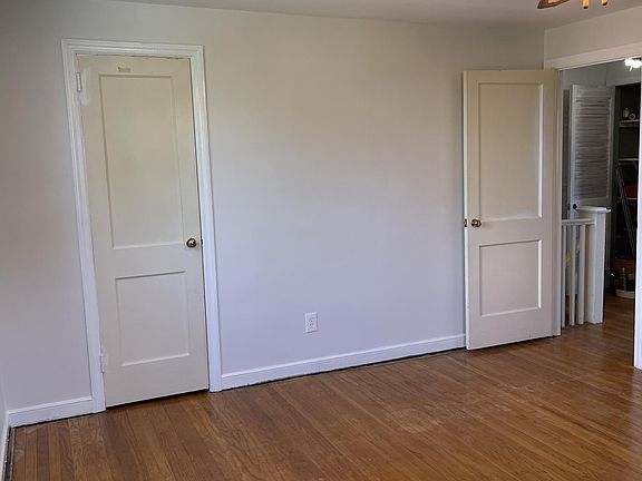 Additional photo of the main bedroom showing one closet.