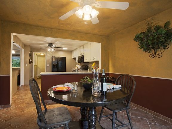 Dining room with large bay window
						:
						Sit back and relax and watch the birds from your large bay window