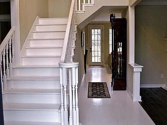 Two Story Entry opens to Formals on either side. Entire home features hardwood floors both upstairs 