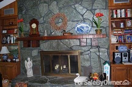 Green Stone fireplace in family room