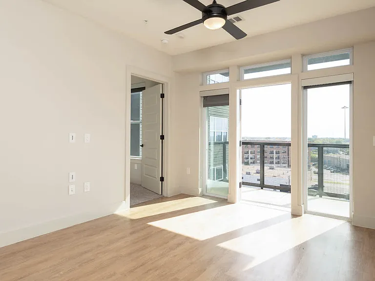 Living Room with Balcony and Hard Surface Flooring