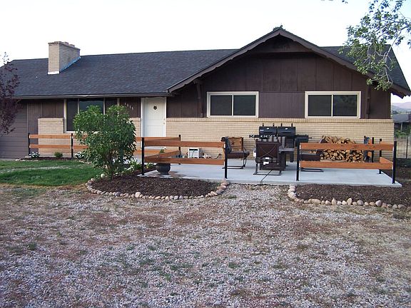 Front of house and patio fire pit.