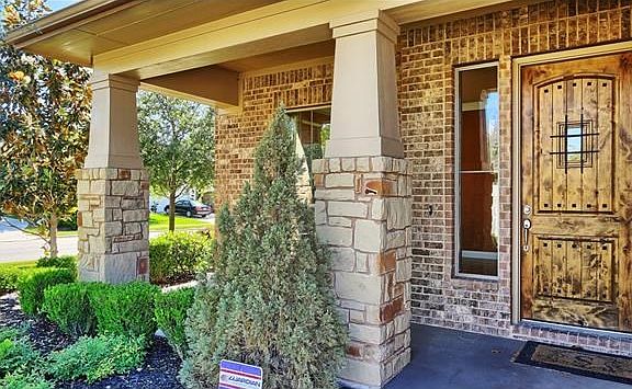Beautiful front porch with gorgeous front door