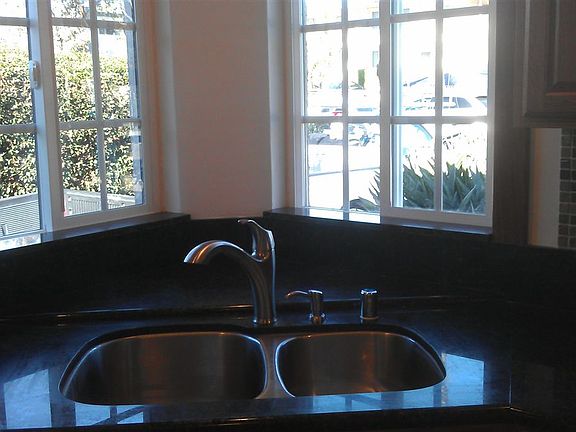 Unique kitchen corner sink w/ new granite counters & dual-pa