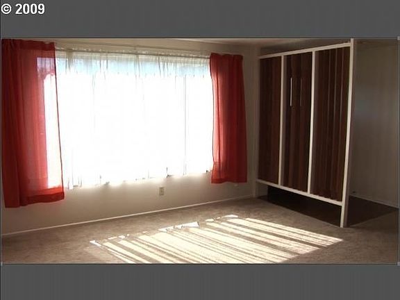 Sun streams into large living room