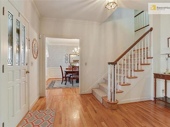 Double stairway...from entry and from kitchen