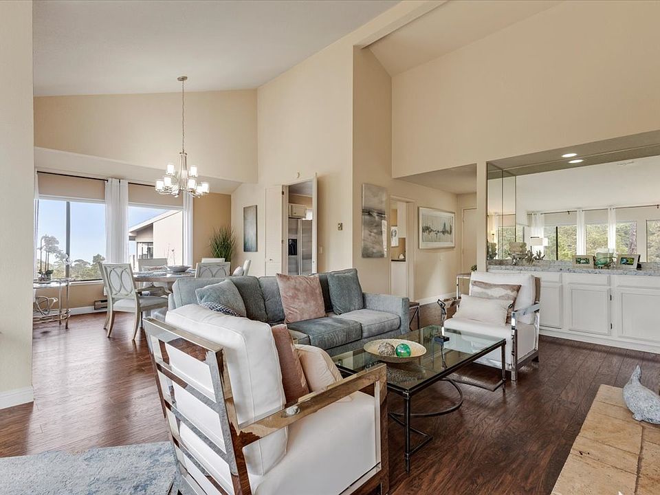 Open living area with soaring ceilings and plenty of light and fabulous views.