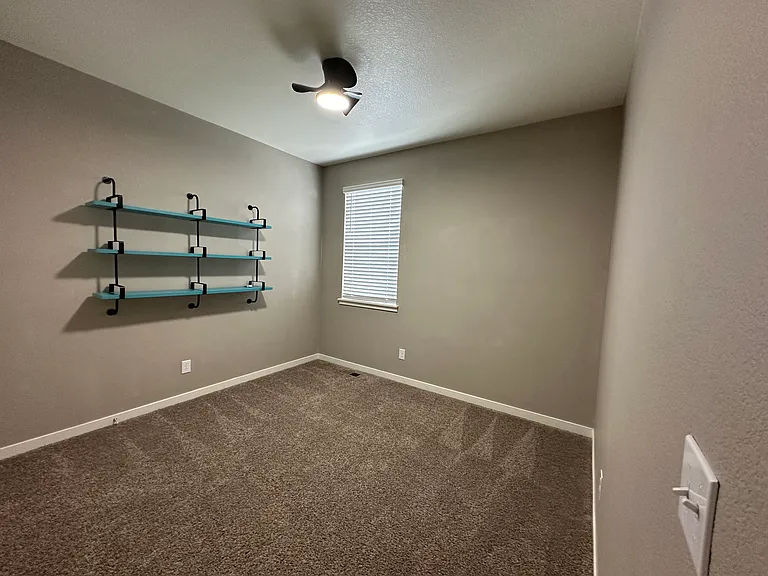 Bedroom 2. Shelves could be removed upon request