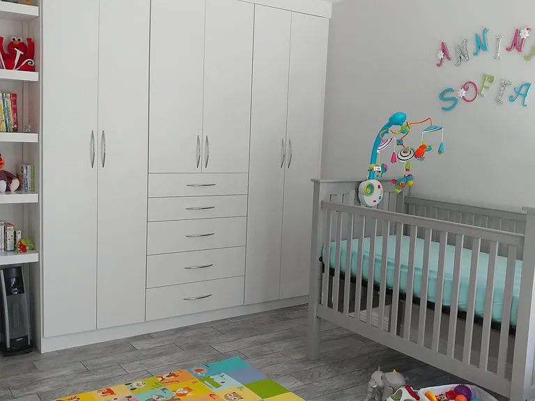 Bedroom 2 built-in California Closets and floating shelves