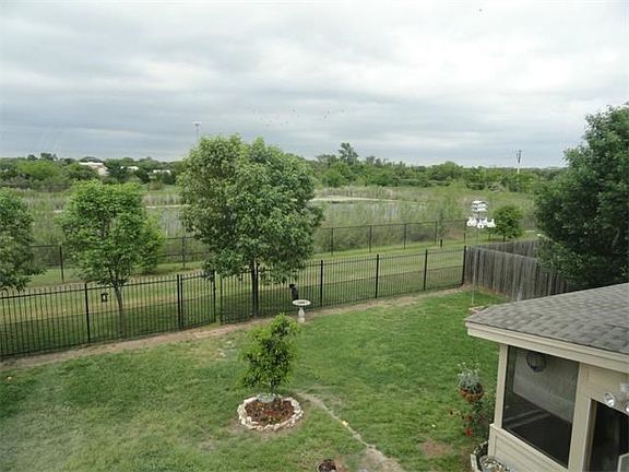 The greenbelt is a short walk to soccer fields and volleyball court at Robinson Park.