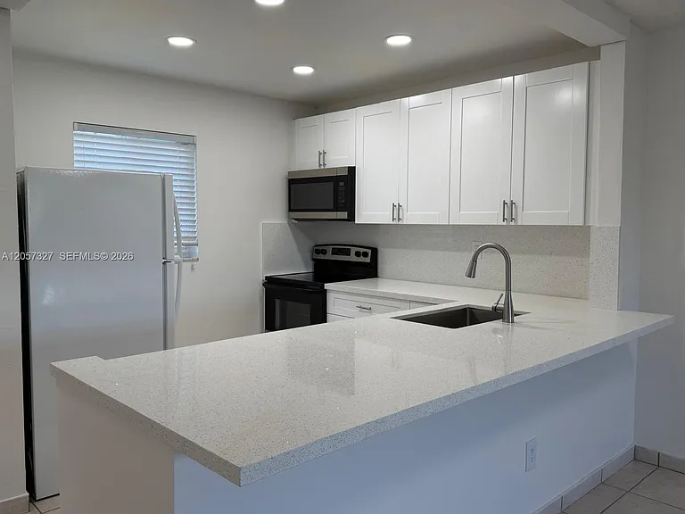 7730 Camino Real #F406 — Photo 3