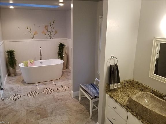 Master bath with free standing soaker tub